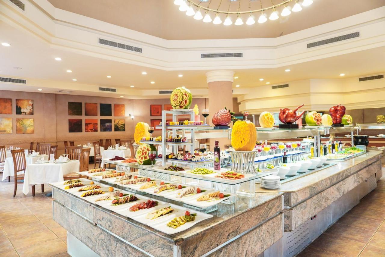 Charmillion Gardens Aquapark Hotel Sharm el-Sheikh Luaran gambar A buffet at a hotel